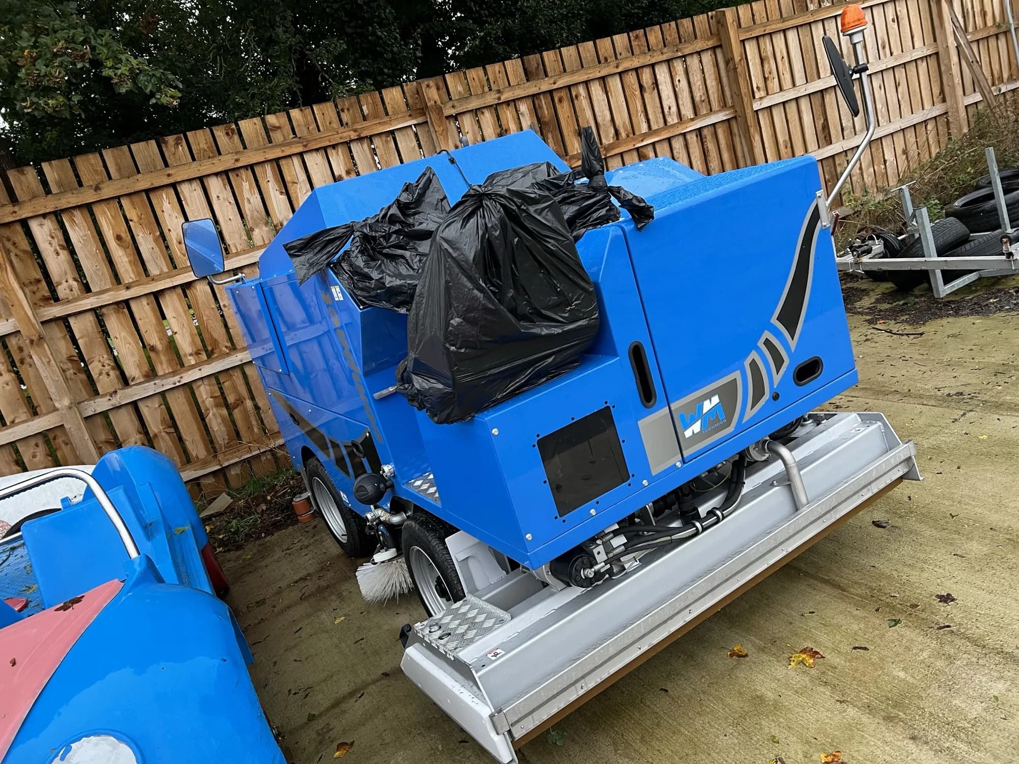A WM Technics ice resurfacer