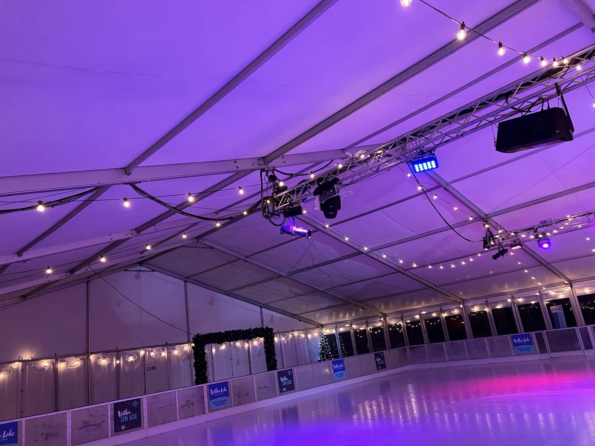 Inside the Willen On Ice marquee with festoon lighting